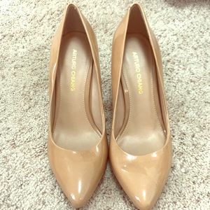 Patent leather nude pumps, 3 1/2 inch heels.